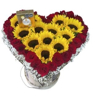 Corazón de girasoles brillantes rodeado de rosas rojas con caja de chocolates Ferrero Rocher Cali
