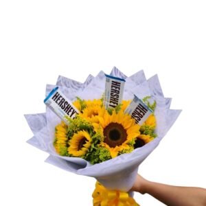 ramo buchon de 12 girasoles amarillos de exportacion con chocolates hershey cookies n creme y empaque blanco cali