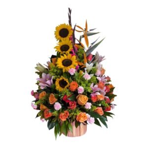 girasoles lirios rosados aves del paraiso rosas naranjas y claveles en base de madera cali